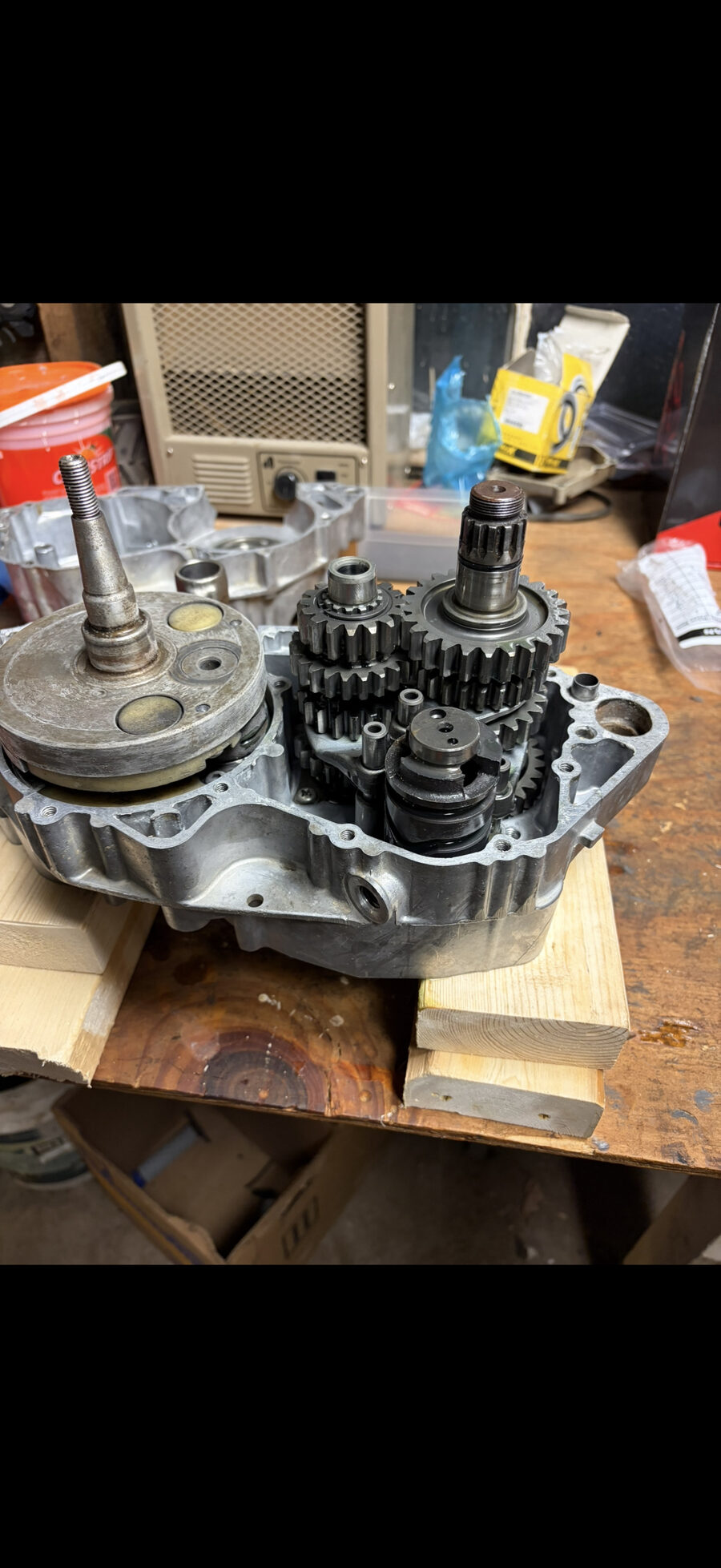 Open gearbox components on a workbench