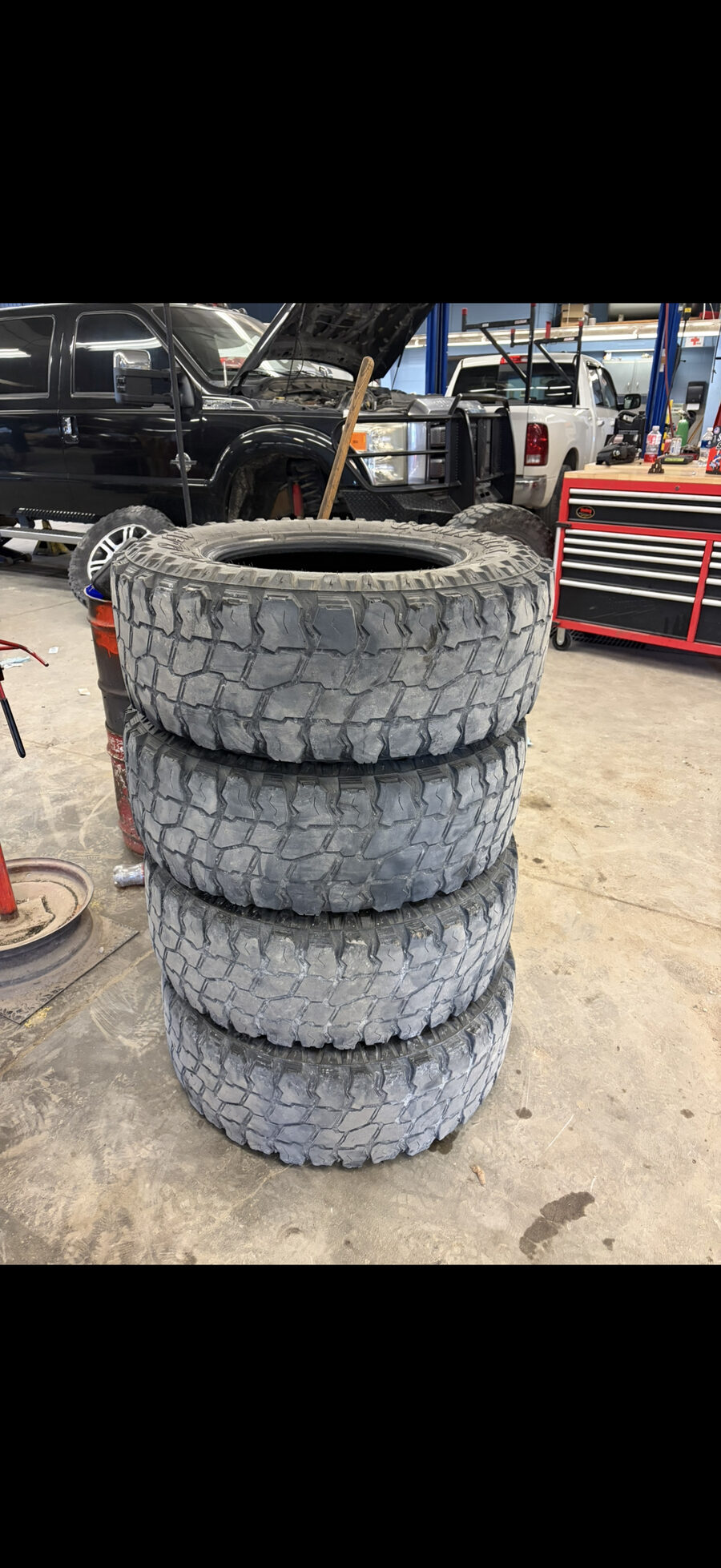 Stack of off-road tires ready in the workshop